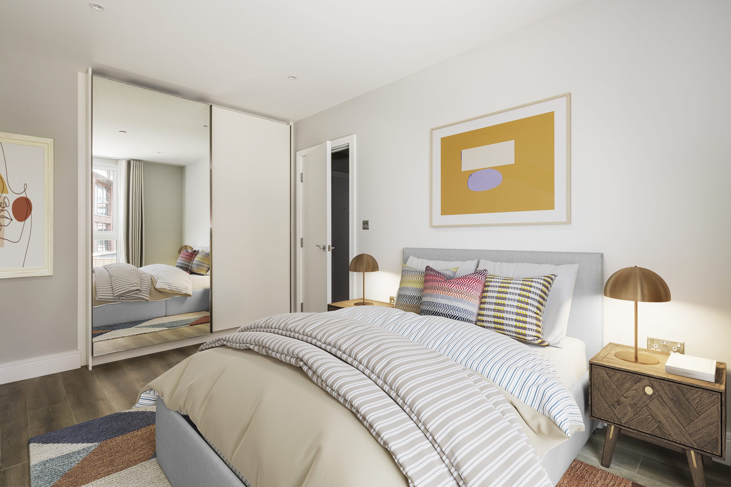 A bright and airy bedroom with a spacious built in wardrobe, a king size bed and 2 bedside tables.