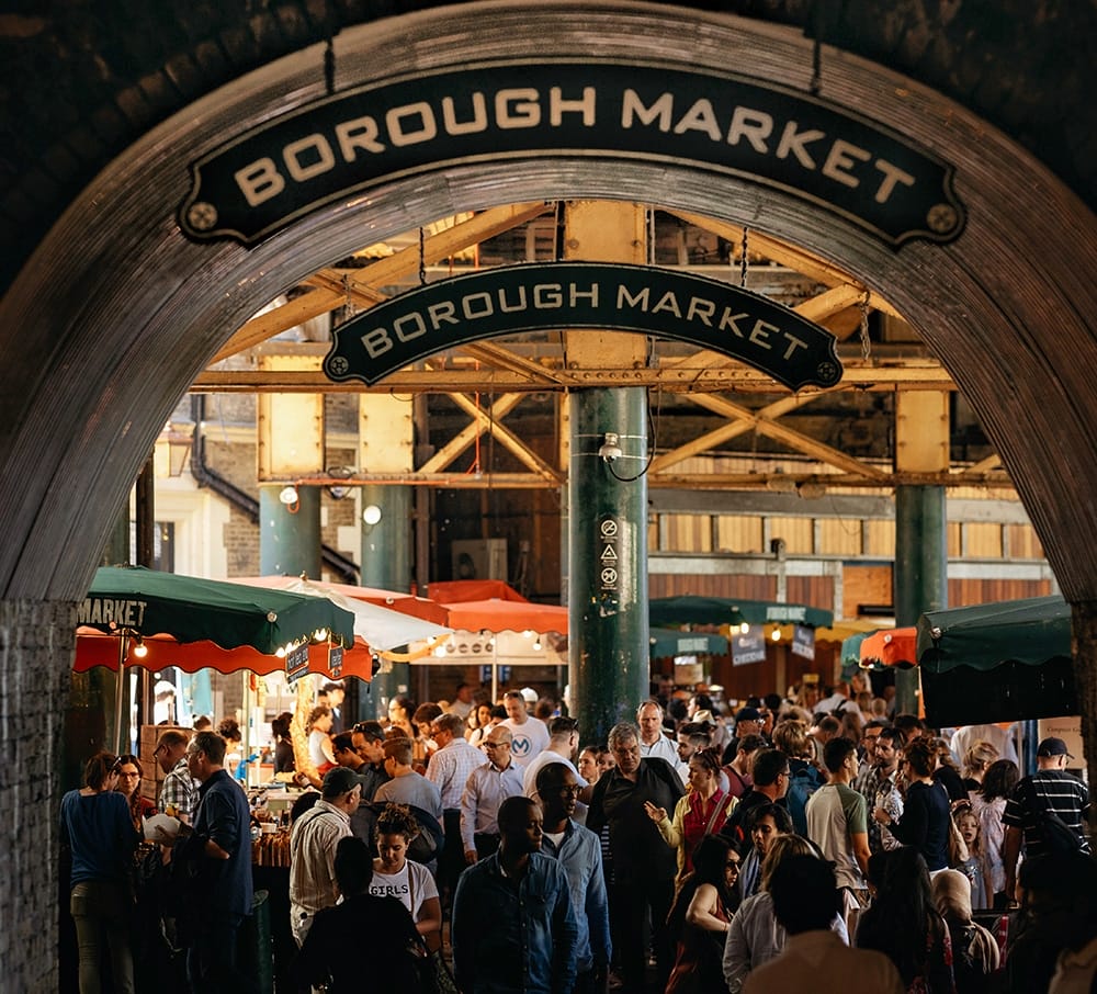 A large crowd of people at Borough Market.