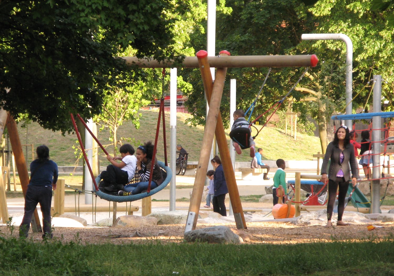 Lots of children enjoying the playground at Fordham Park.