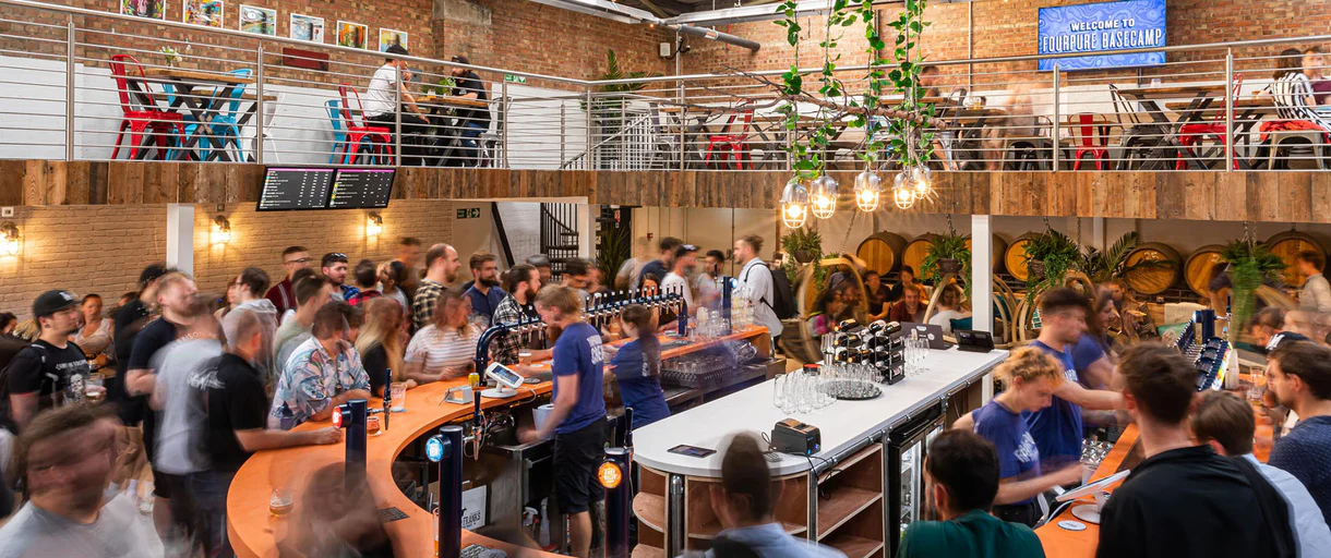 The interior bar and seating area of Four Pour Brewery.