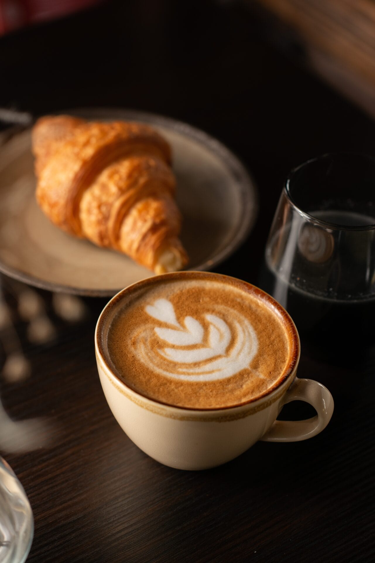 A cappuccino and croissant.