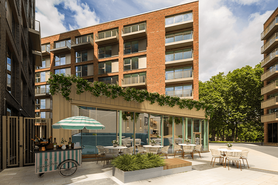 A commercial unit attached to the residential apartments which displays how it could look as a cafe with outdoor seating.