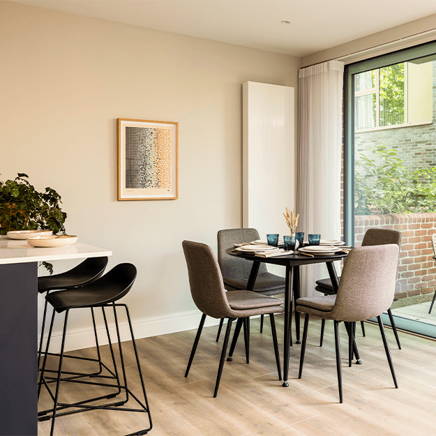 A dining area at an apartment at Neptune Wharf.
