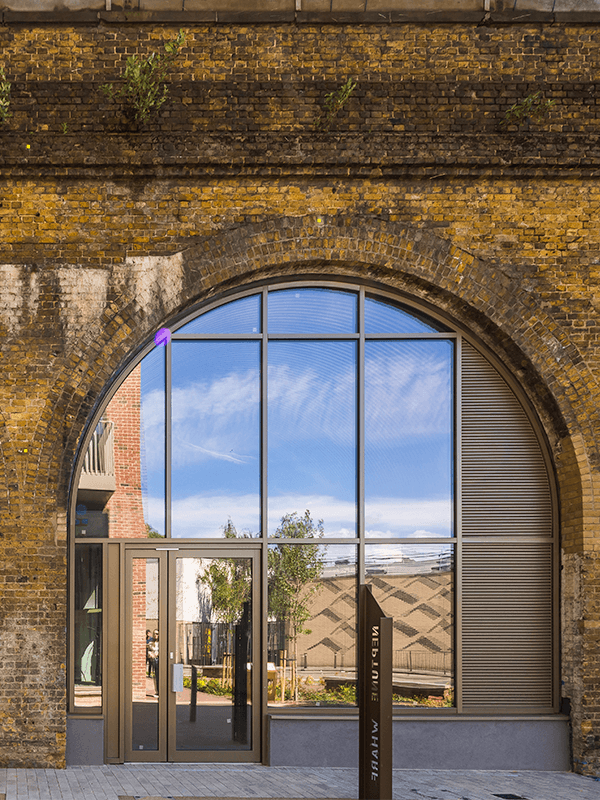 Exterior of a Neptune Wharf commercial arch